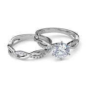 Two-piece white gold wedding ring set with a round diamond.