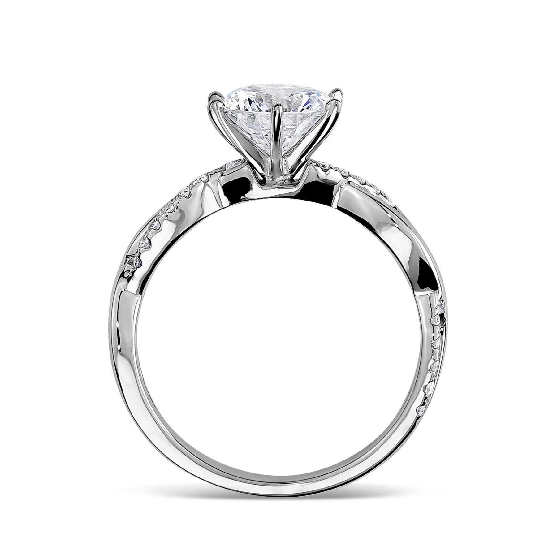 Side profile view of a white gold engagement ring with a twisted band.