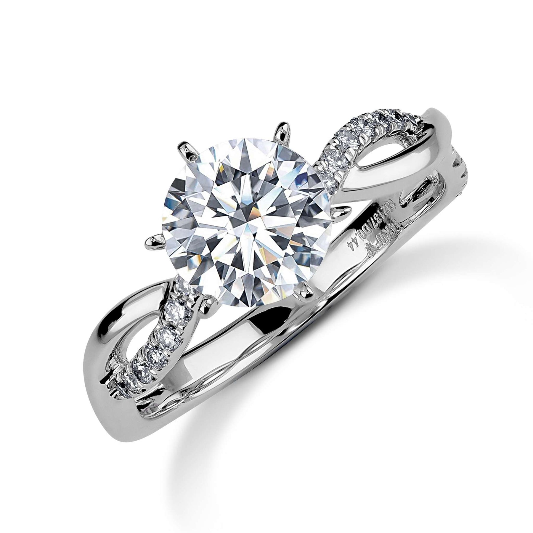 14k white gold engagement ring featuring a large round diamond and twisted band.