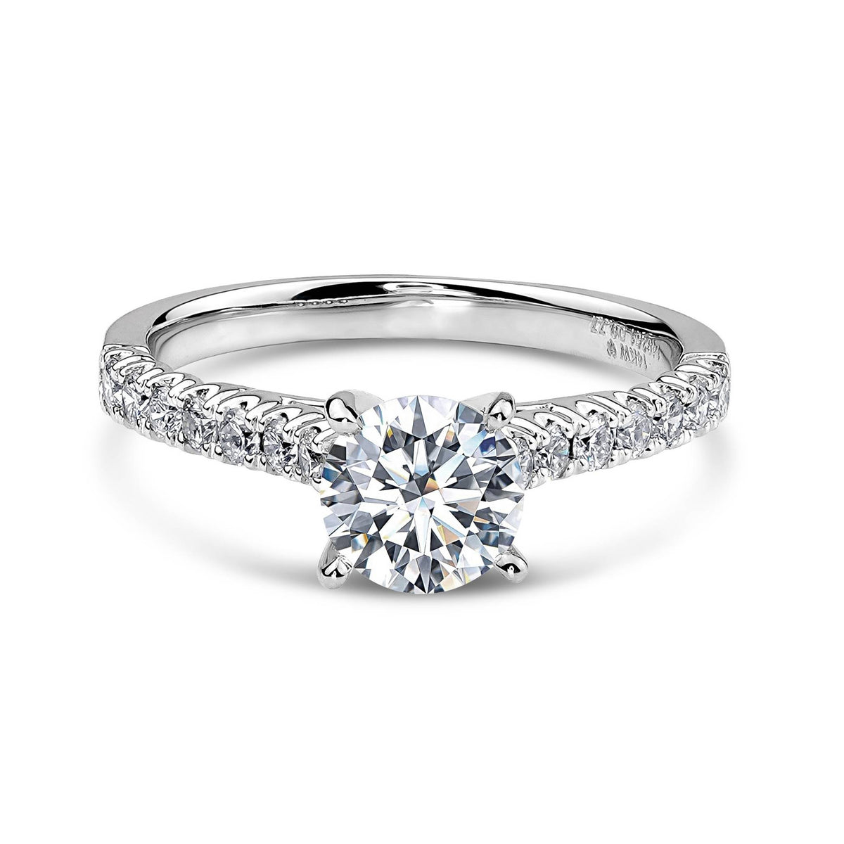 14k white gold engagement ring with a round diamond and a pavé band.