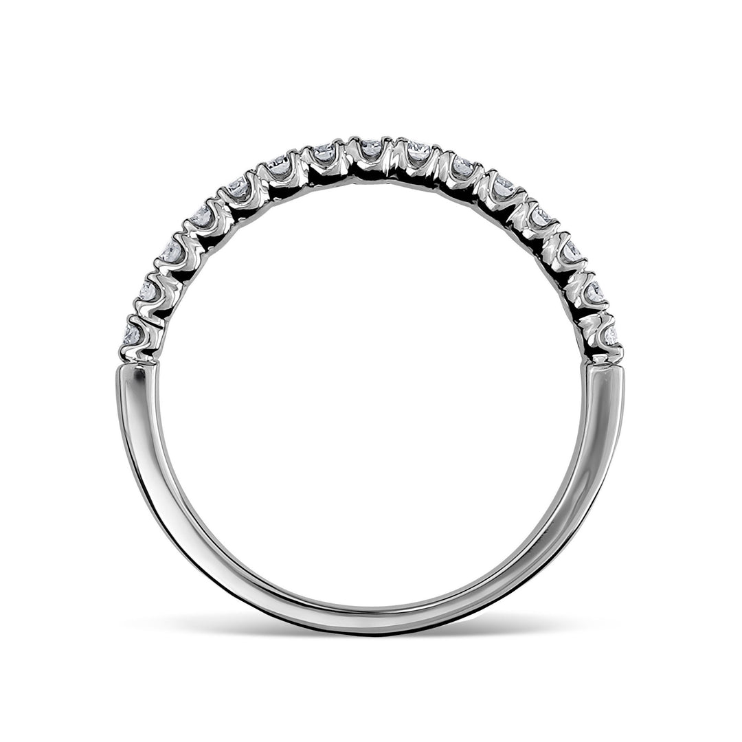 Single white gold pavé diamond wedding ring on a white background.