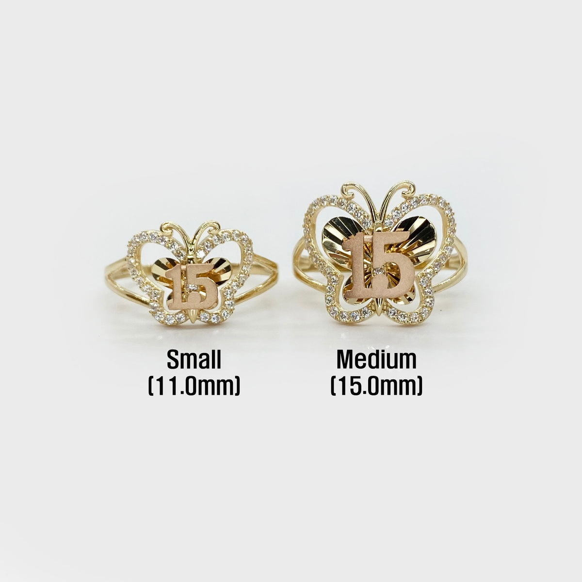 Two 10k - 14k butterfly shaped Quinceanera rings, one small and one medium.