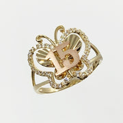 10k - 14k Gold ring with butterfly and number 15 design  on a white background