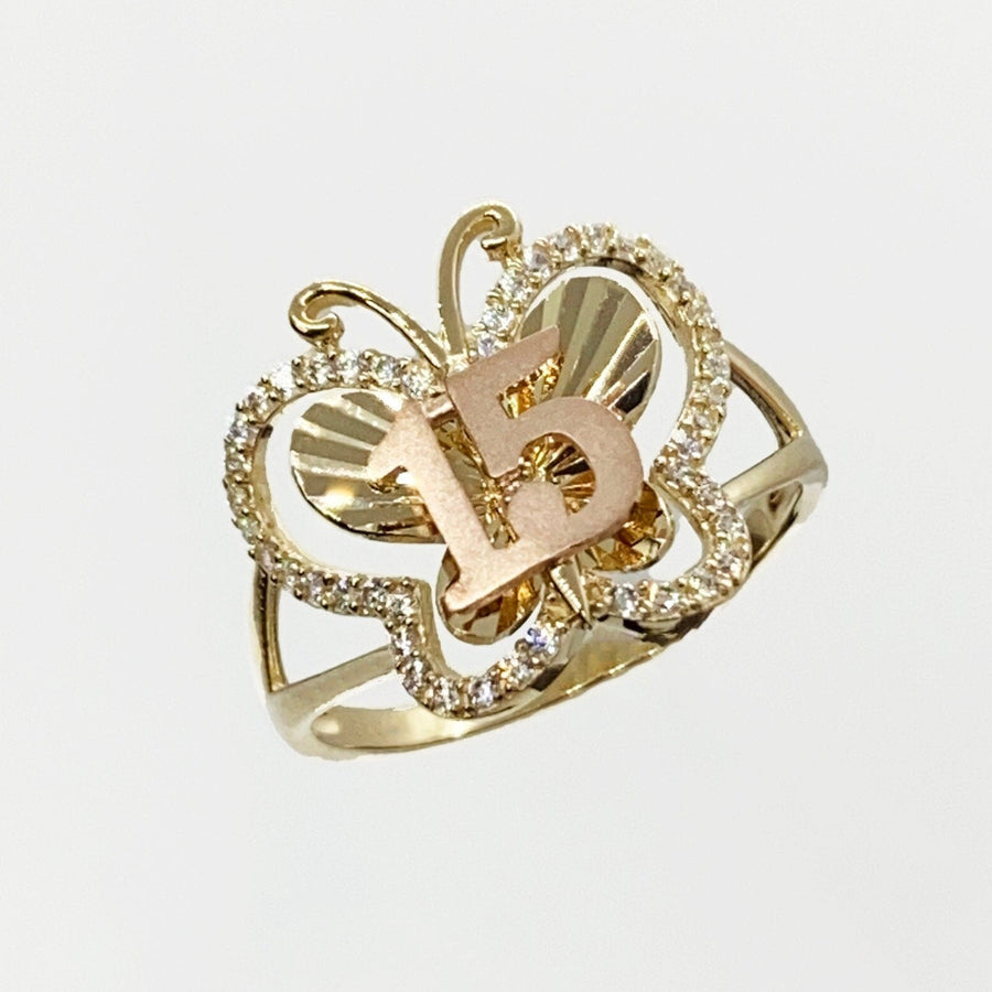 10k - 14k Gold ring with butterfly and number 15 design  on a white background