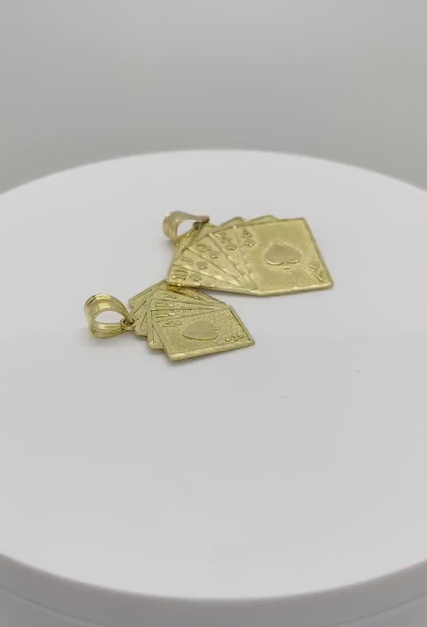 Video showcase of two 10k yellow gold Royal Flush playing cards pendants