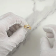 Product video showing two-tone gold quinceañera crown ring with cubic zirconia.
