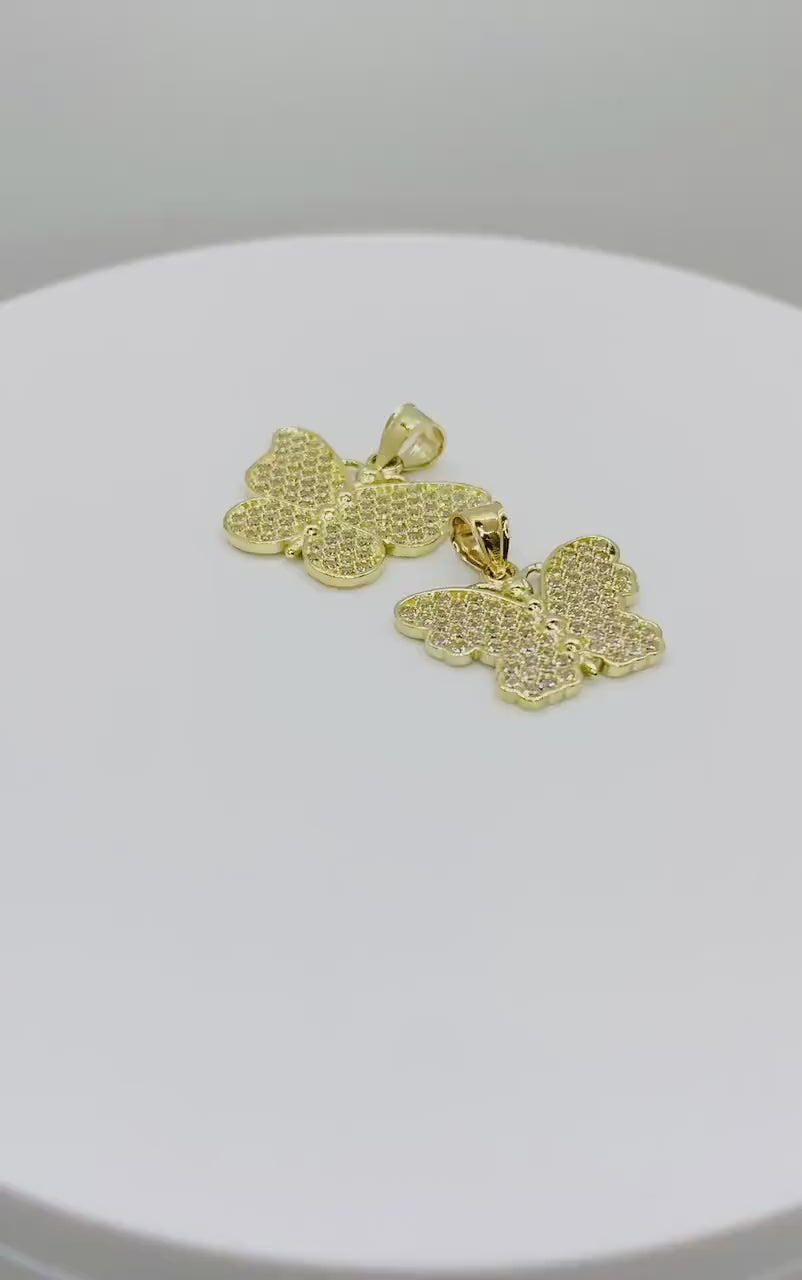 Video showcase of two 10k gold butterfly CZ pendants side by side.
