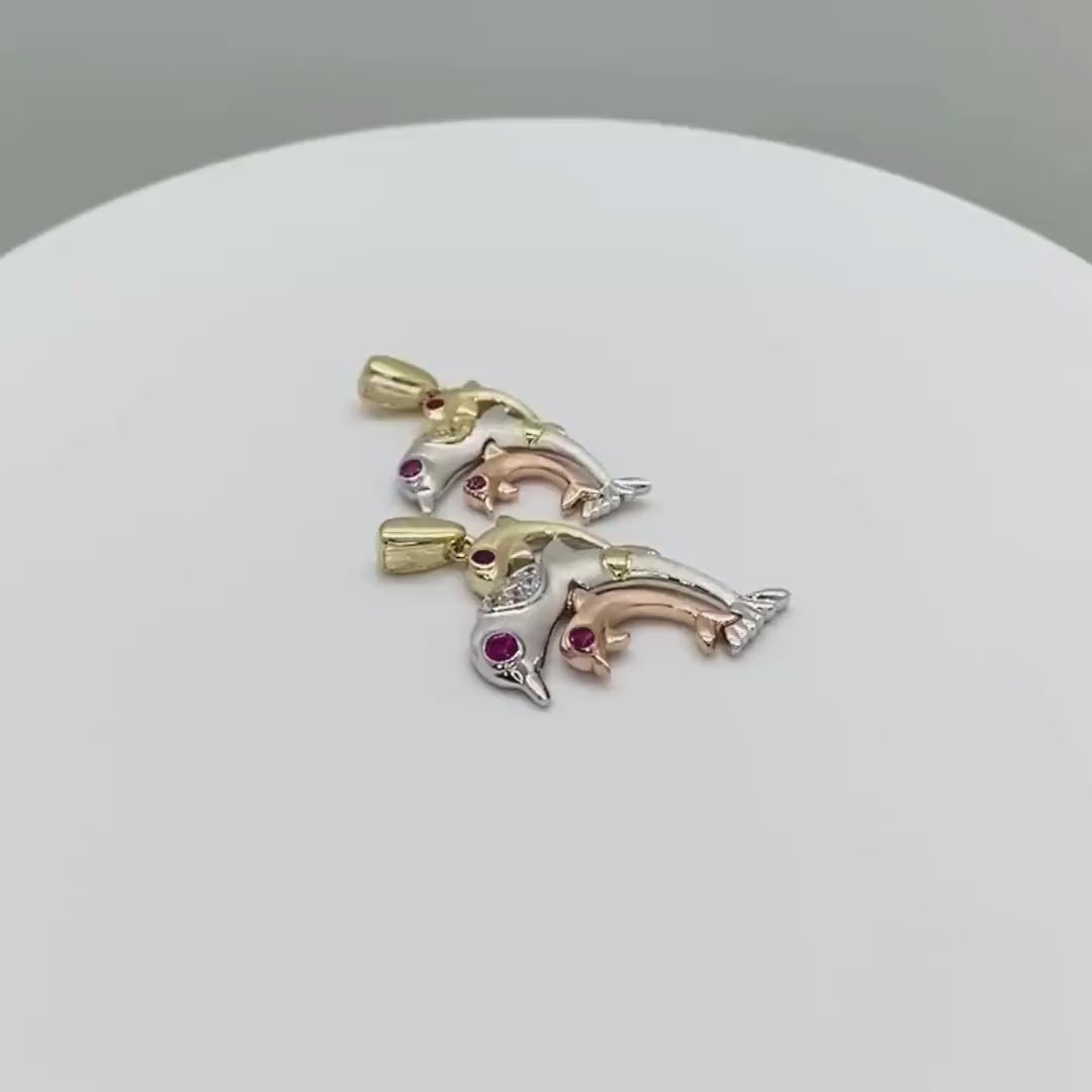 Video showcase of two 14k tri-color gold trio dolphin CZ pendants
